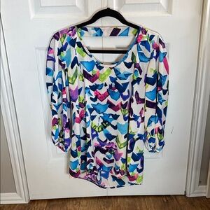 Vibrant geometric pattern blouse